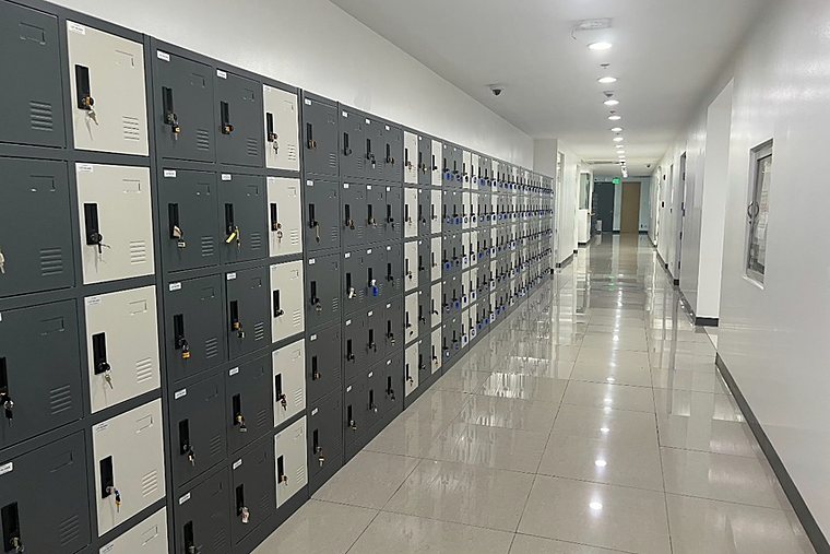 Shared lockers along the corridor.
